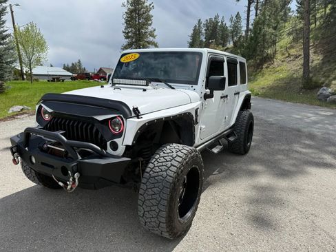 Used 2015 Jeep Wrangler Unlimited Rubicon w/ Connectivity Group AWD/4WD image 1