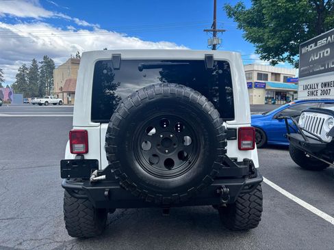 Used 2014 Jeep Wrangler Unlimited Sahara w/ Dual Top Group AWD/4WD image 4