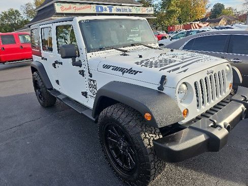Used 2013 Jeep Wrangler Unlimited Sport image 1