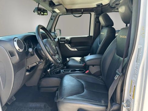 Used 2014 Jeep Wrangler Unlimited Sahara w/ Dual Top Group AWD/4WD image 9