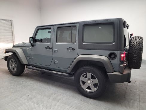 Used 2015 Jeep Wrangler Unlimited Sport w/ Connectivity Group AWD/4WD image 3