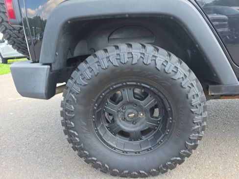 Used 2015 Jeep Wrangler Unlimited Rubicon w/ Dual Top Group AWD/4WD image 11