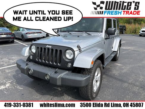 Used 2014 Jeep Wrangler Unlimited Sahara w/ Dual Top Group AWD/4WD image 1