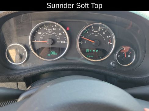 Used 2012 Jeep Wrangler Unlimited Sahara w/ Dual Top Group AWD/4WD image 21