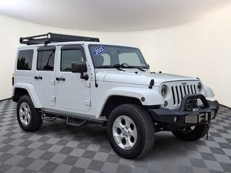 Used 2015 Jeep Wrangler Unlimited Sahara w/ Dual Top Group AWD/4WD video 1