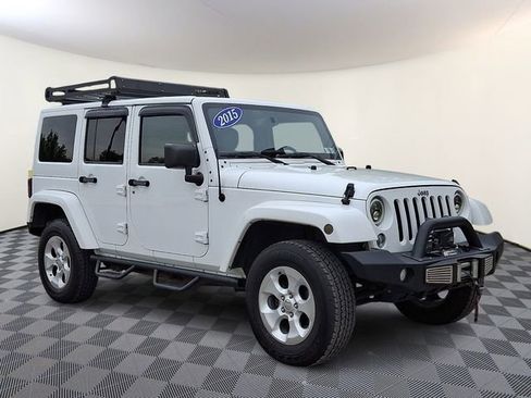 Used 2015 Jeep Wrangler Unlimited Sahara w/ Dual Top Group AWD/4WD image 1