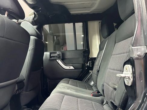Used 2012 Jeep Wrangler Unlimited Sahara w/ Dual Top Group AWD/4WD image 19