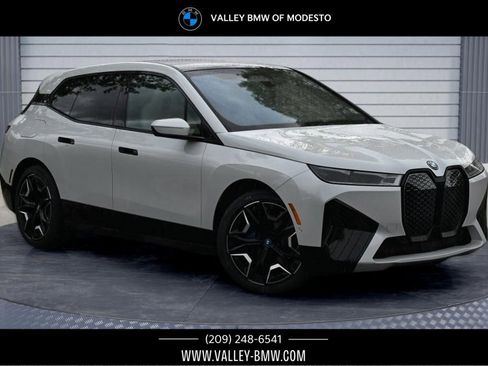 Certified 2023 BMW iX xDrive50 w/ Premium Package AWD/4WD image 1