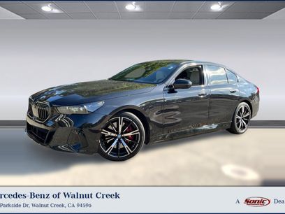 Used 2025 BMW 550e xDrive w/ Premium Package