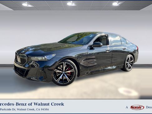 Used 2025 BMW 550e xDrive w/ Premium Package AWD/4WD image 1