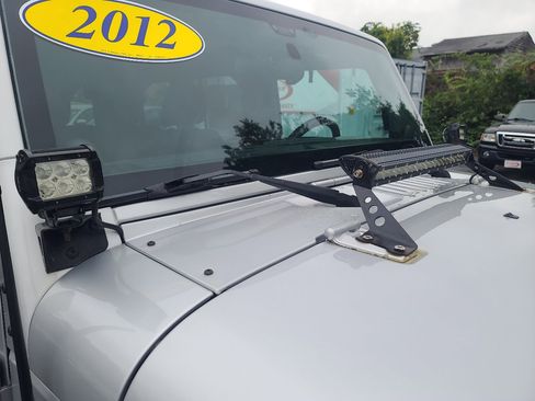 Used 2012 Jeep Wrangler Unlimited Sport w/ Dual Top Group image 23