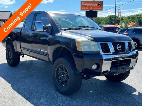 Used 2005 Nissan Titan LE w/ (U01) Nissan Navigation Pkg AWD/4WD image 1