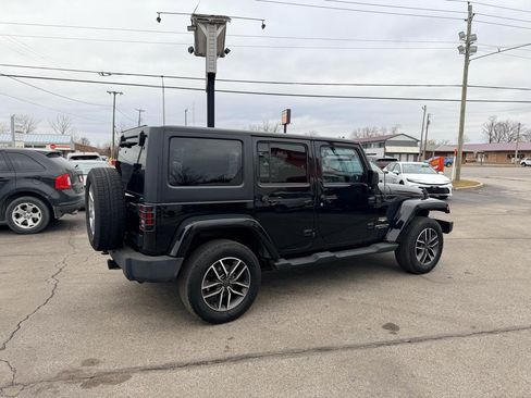 Used 2013 Jeep Wrangler Unlimited Sahara w/ Dual Top Group image 6