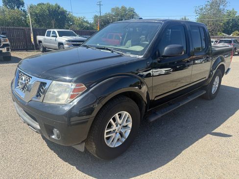 Used 2014 Nissan Frontier SV RWD image 1