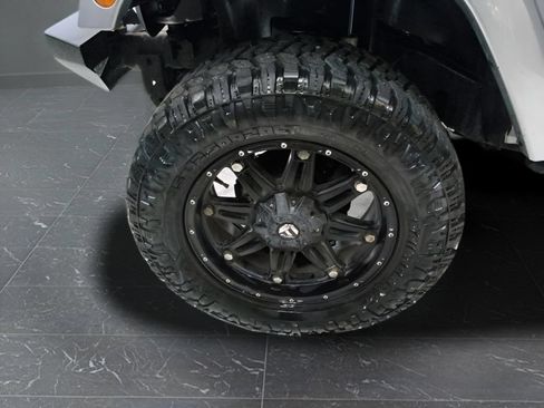 Used 2014 Jeep Wrangler Unlimited Sahara w/ Dual Top Group AWD/4WD image 23