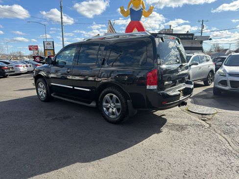 Used 2014 Nissan Armada Platinum w/ 2nd Row Captain Seat Package AWD/4WD image 4