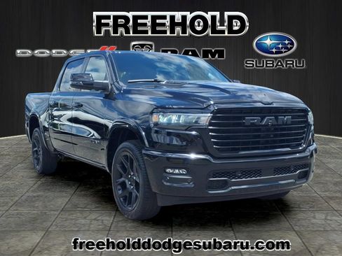 Used 2025 RAM 1500 Laramie w/ Night Edition AWD/4WD image 1