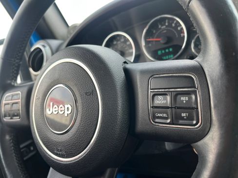 Used 2012 Jeep Wrangler Unlimited Sahara w/ Dual Top Group AWD/4WD image 26