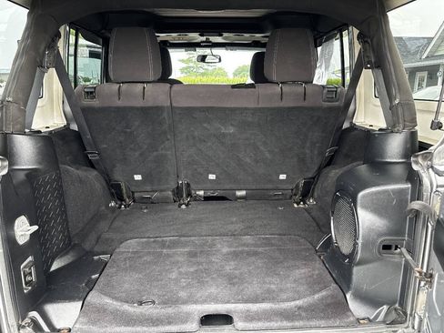Used 2014 Jeep Wrangler Unlimited Sahara w/ Dual Top Group AWD/4WD image 22