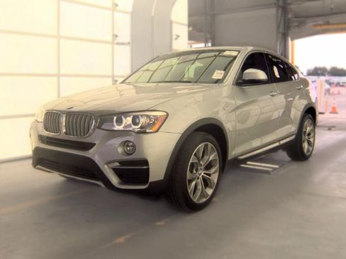 Used 2016 BMW X4 xDrive35i AWD/4WD image 1