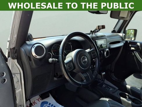 Used 2013 Jeep Wrangler Unlimited Sahara w/ Dual Top Group AWD/4WD image 9