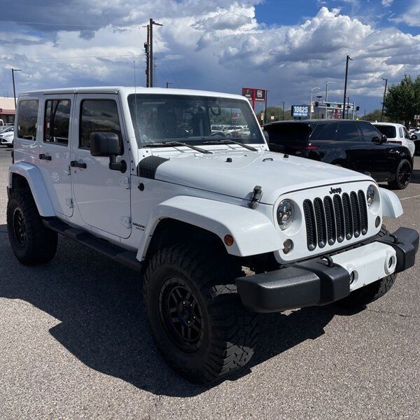 Used 2012 Jeep Wrangler Unlimited Sahara AWD/4WD image 1