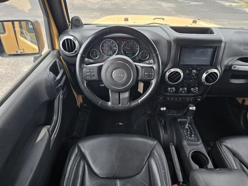 Used 2014 Jeep Wrangler Unlimited Rubicon w/ Dual Top Group AWD/4WD image 16