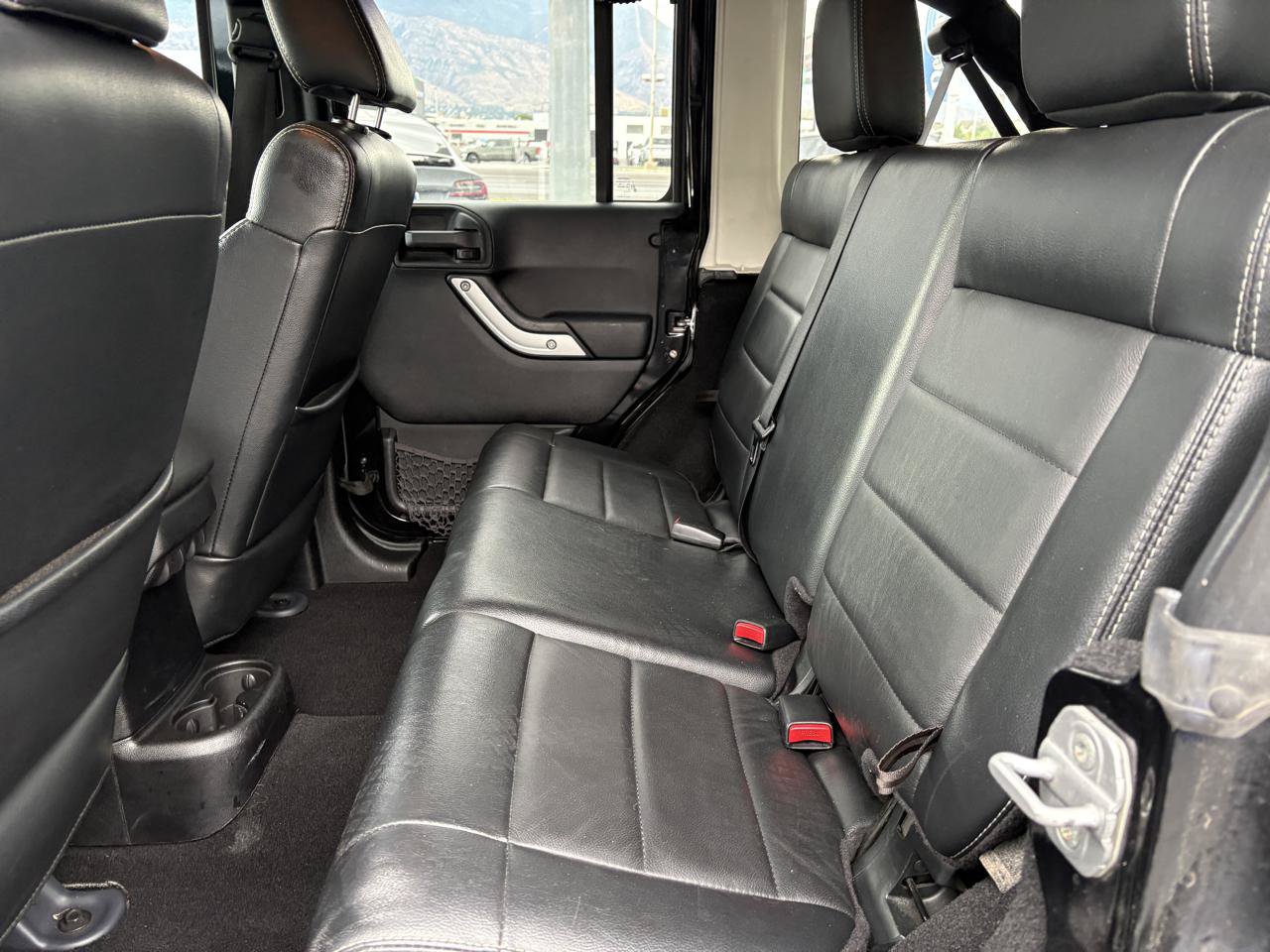 Used 2012 Jeep Wrangler Unlimited Rubicon w/ Dual Top Group AWD/4WD image 11