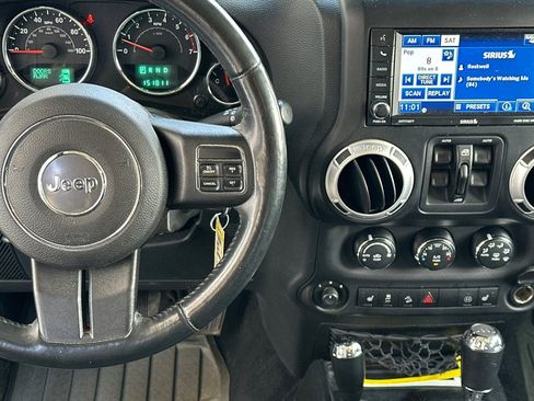 Used 2012 Jeep Wrangler Unlimited Sahara w/ Mopar Chrome Edition Group AWD/4WD image 9