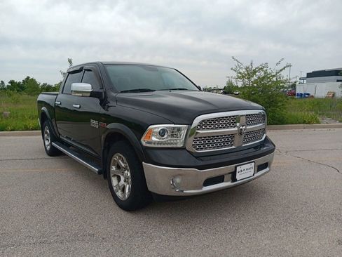 Used 2017 RAM 1500 Laramie w/ Convenience Group AWD/4WD image 1