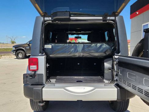 Used 2013 Jeep Wrangler Unlimited Sahara w/ Dual Top Group AWD/4WD image 22