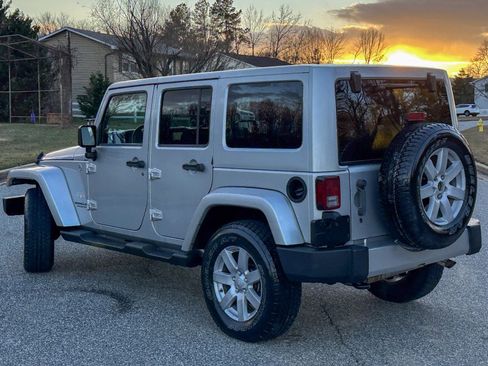 Used 2012 Jeep Wrangler Unlimited Sahara w/ Dual Top Group image 11