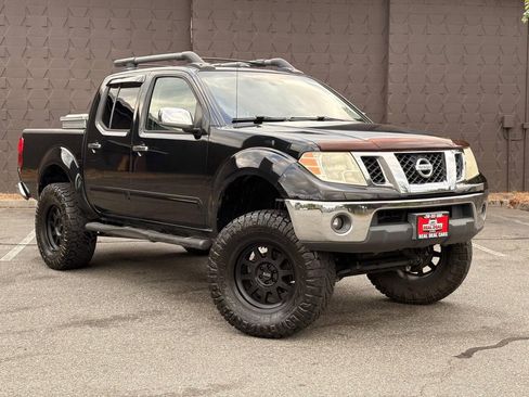 Used 2011 Nissan Frontier SL RWD image 2