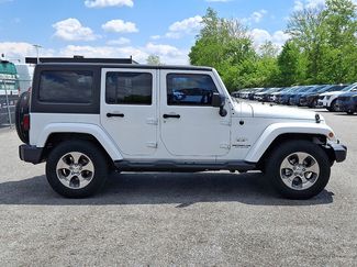 Used 2017 Jeep Wrangler Unlimited Sahara w/ Dual Top Group AWD/4WD video 4