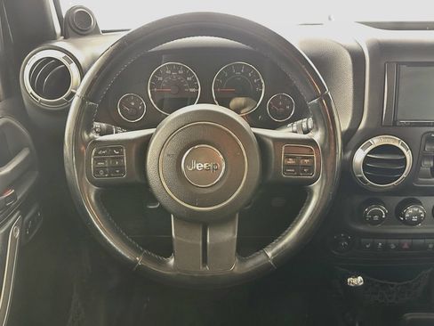 Used 2013 Jeep Wrangler Unlimited Sahara w/ Dual Top Group AWD/4WD image 12