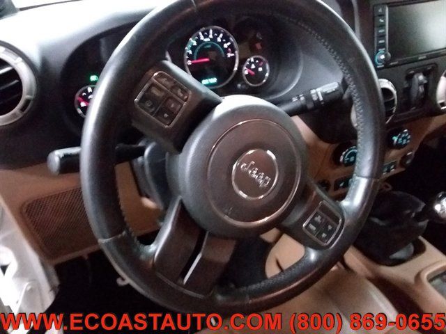 Used 2012 Jeep Wrangler Unlimited Sahara w/ Dual Top Group AWD/4WD image 11