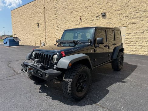 Used 2014 Jeep Wrangler Unlimited Sport AWD/4WD image 1