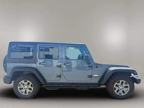 Used 2015 Jeep Wrangler Unlimited Rubicon w/ Dual Top Group AWD/4WD image 4