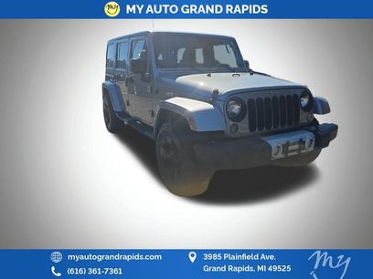Used 2014 Jeep Wrangler Unlimited Sahara w/ Dual Top Group