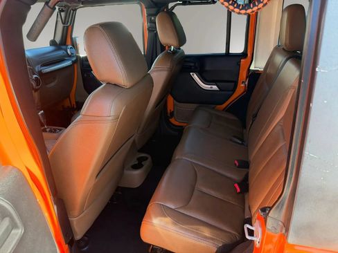 Used 2013 Jeep Wrangler Unlimited Sahara w/ Dual Top Group AWD/4WD image 11