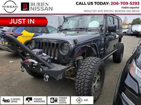 Used 2010 Jeep Wrangler Unlimited Sahara w/ Limited Group image 1