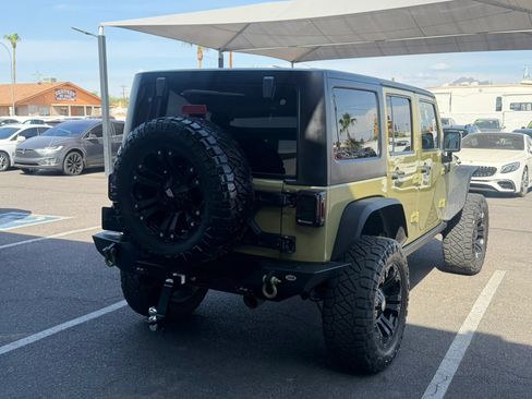 Used 2013 Jeep Wrangler Unlimited Rubicon w/ Dual Top Group AWD/4WD image 9