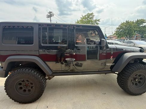Used 2014 Jeep Wrangler Unlimited Rubicon w/ Dual Top Group AWD/4WD image 7
