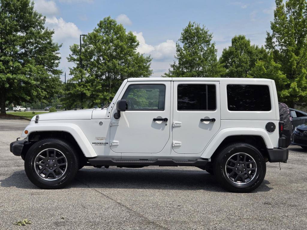 Used 2012 Jeep Wrangler Unlimited Sahara w/ Connectivity Group AWD/4WD image 10