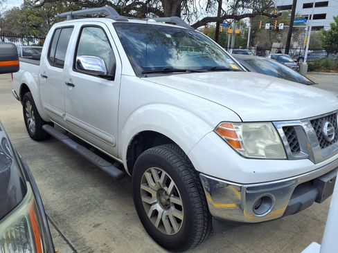 Used 2012 Nissan Frontier SL image 1