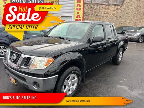 Used 2010 Nissan Frontier SE image 1