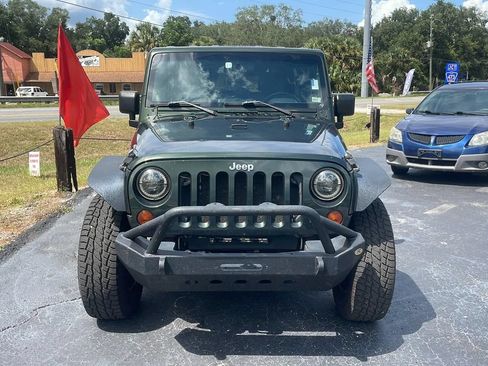 Used 2010 Jeep Wrangler Unlimited Rubicon w/ Dual Top Group AWD/4WD image 2