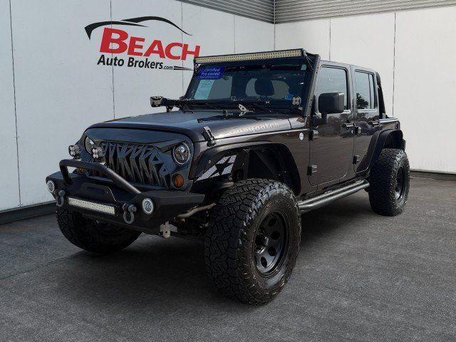 Used 2013 Jeep Wrangler Unlimited Sport w/ Connectivity Group AWD/4WD image 1