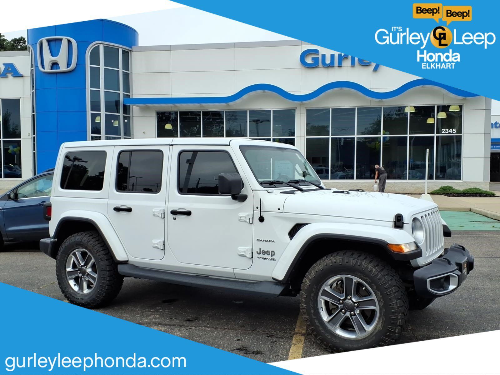 Used 2019 Jeep Wrangler Unlimited Sahara w/ Uconnect 4C Nav & Sound Group AWD/4WD image 1