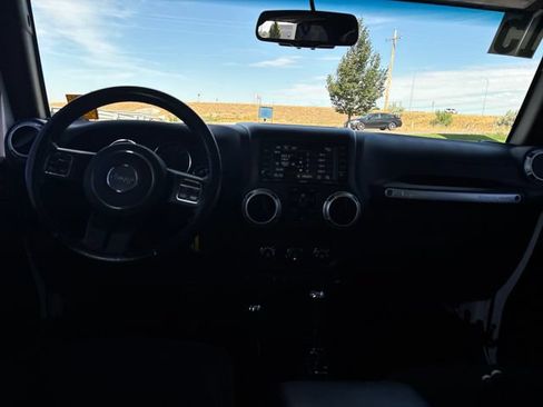 Used 2015 Jeep Wrangler Unlimited Sahara w/ Dual Top Group AWD/4WD image 12